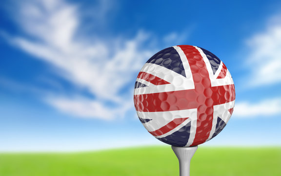 Golf ball with United Kingdom flag colors sitting on a tee