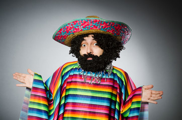 Person wearing sombrero hat in funny concept