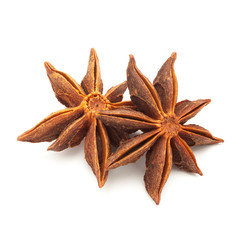 Macro closeup of Organic Star anise or Chakra Phool (Illicium verum) isolated on white background.
