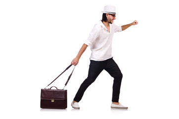 Young man with hat and handbag isolated on white