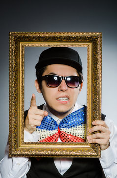 Funny man with picture frame