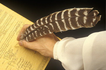 Quill pen signing a declaration