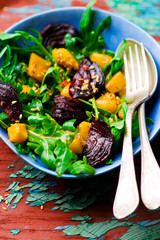 vegetable salad with pumpkin, beet, arugula .