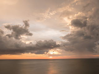 Naklejka na ściany i meble Sun set cinematic scene with gray cloud sky taken with rule of t