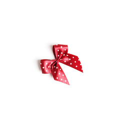 Red ribbon bow on white background. studio shot