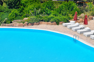 outdoor Swimming pool and lush vegetation