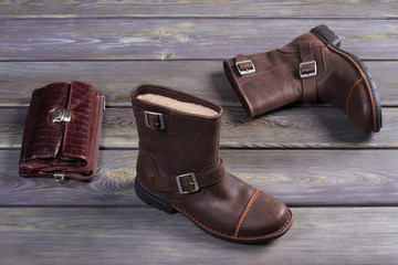 Brown boots and purse.