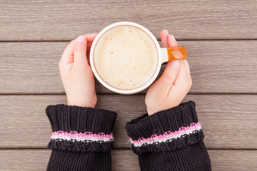 Girl hand with coffee