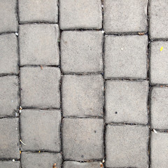 pavement Background of grey cobble stones