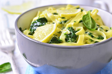 Homemade egg noodle with spinach.