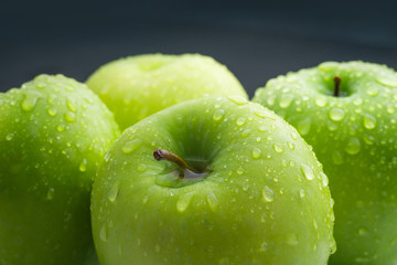 Green apples composition with water drop