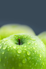 Green apples composition with water drop