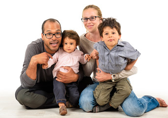 Happy interracial family isolated on white