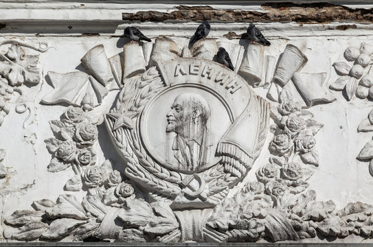 Closeup old soviet bas-relief on facade