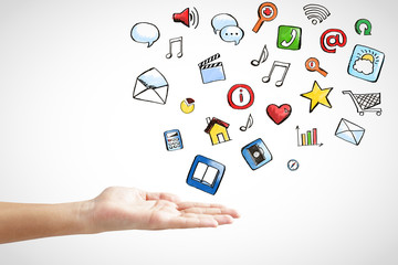 Man hand with social media icons concept