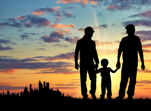 Silhouette of gay parents with a child