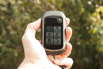 Handheld GPS transmiter in nahd on nature
