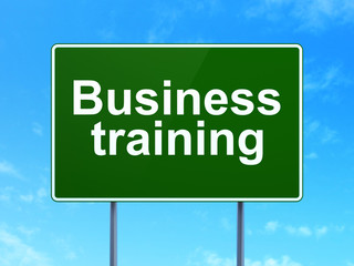 Education concept: Business Training on road sign background