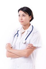 Fototapeta premium female doctor looking up on blank space
