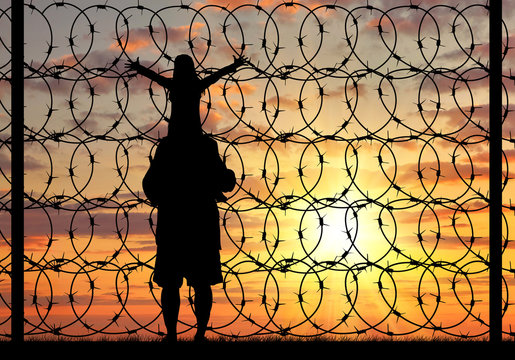 Silhouette of a family refugee