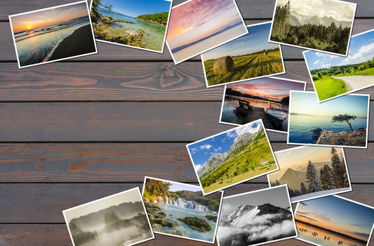Travel photos on wooden background