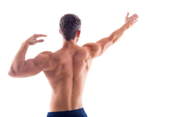 Muscular bodybuilder guy doing exercises