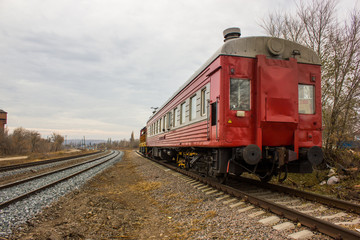 Fototapeta na wymiar red-yellow locomotive train on the tracks