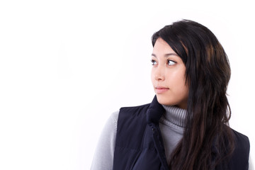 confident asian-caucasian woman looking up