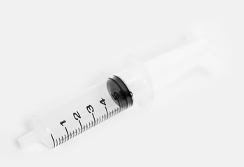 Disposable Syringe on White