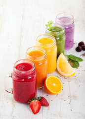 Smoothies, juices, beverages, drinks variety with fresh fruits and berries.