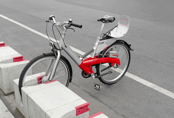 Bicycle parked on a city street.