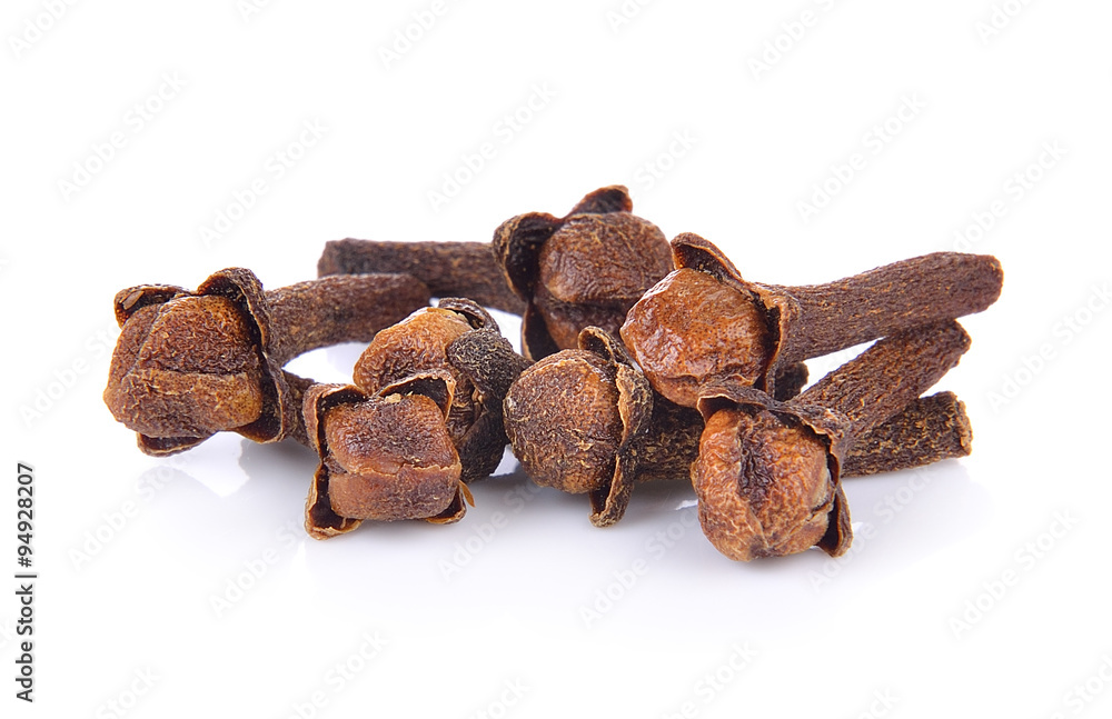 Wall mural Spice cloves on white background