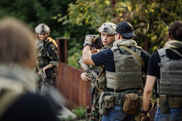 Private Military Contractor inspect the documents on blocked