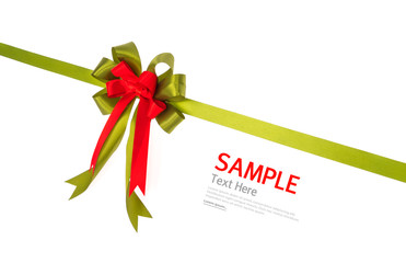 Shiny red and green ribbon on white background with copy space.