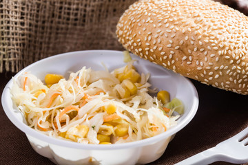 Vegetable salad and white bun