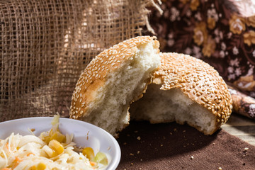 Pieces of bun with salad