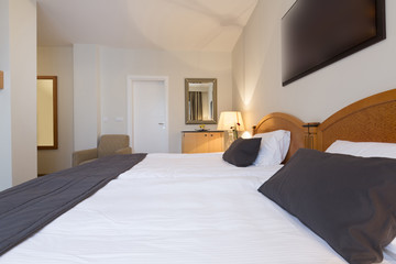 Interior of a hotel bedroom in the morning - sunlight