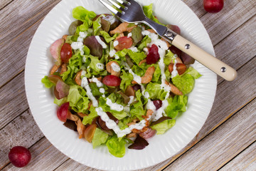 Chicken and red grape salad. View from above, top studio shot