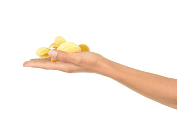 Hand holds potato chips
