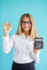 Business woman show calculator