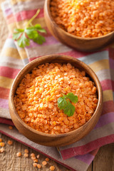 raw healthy red lentils in bowl