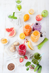 Smoothies, juices, beverages, drinks variety with fresh fruits and berries .
