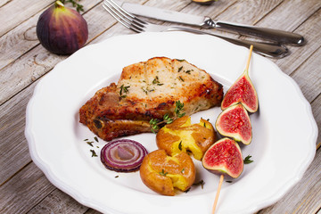 Grilled Pork Chop with Figs on Scewer, Crisp Roasted Potatoes and Thyme