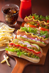 grilled hot dogs with vegetables ketchup mustard