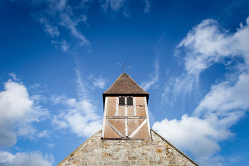 British Church Bell Tower on Cloudy Blue Sky,  17th Century Architecture