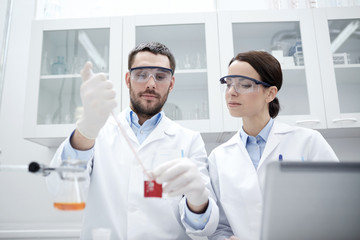 young scientists making test or research in lab