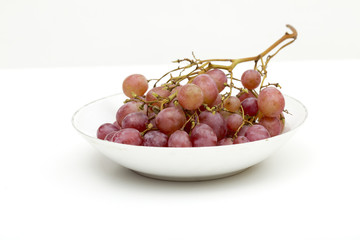 Grapes on the white background
