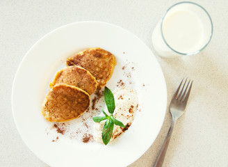 Pancakes with sour cream for breakfast