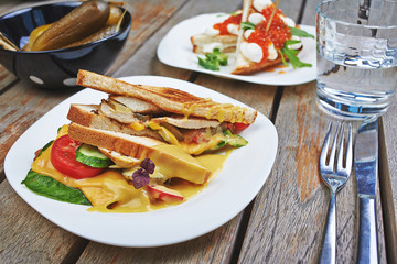 delicious breakfast toast with chicken and vegetables