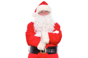 Kind Santa Claus standing with crossed arms, isolated on white background